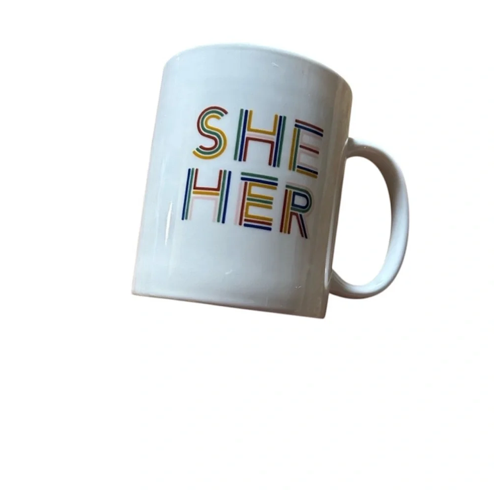 Room Essentials “She Her” coffee mug- white mug with rainbow text